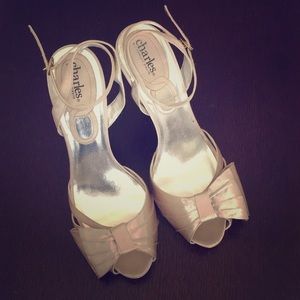 Champagne colored satin heel with bow on top